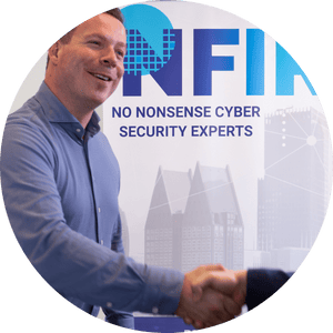 A man in a blue shirt shakes hands with another person in front of a sign that reads "NO NONSENSE CYBER SECURITY EXPERTS," emphasizing expertise in pen testing and security monitoring.